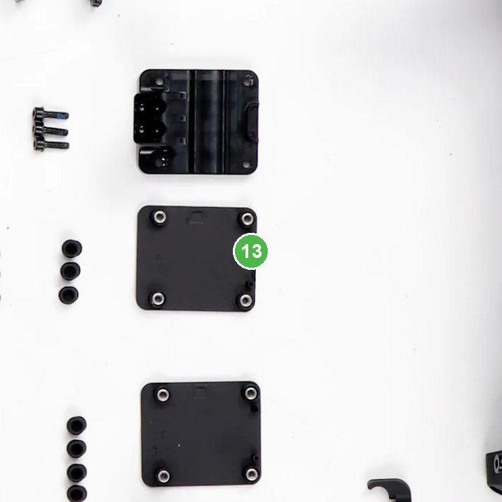 Cubierta del Gancho de la Hebilla señalada con el número 13 en el diagrama de despiece del DJI Agras T100